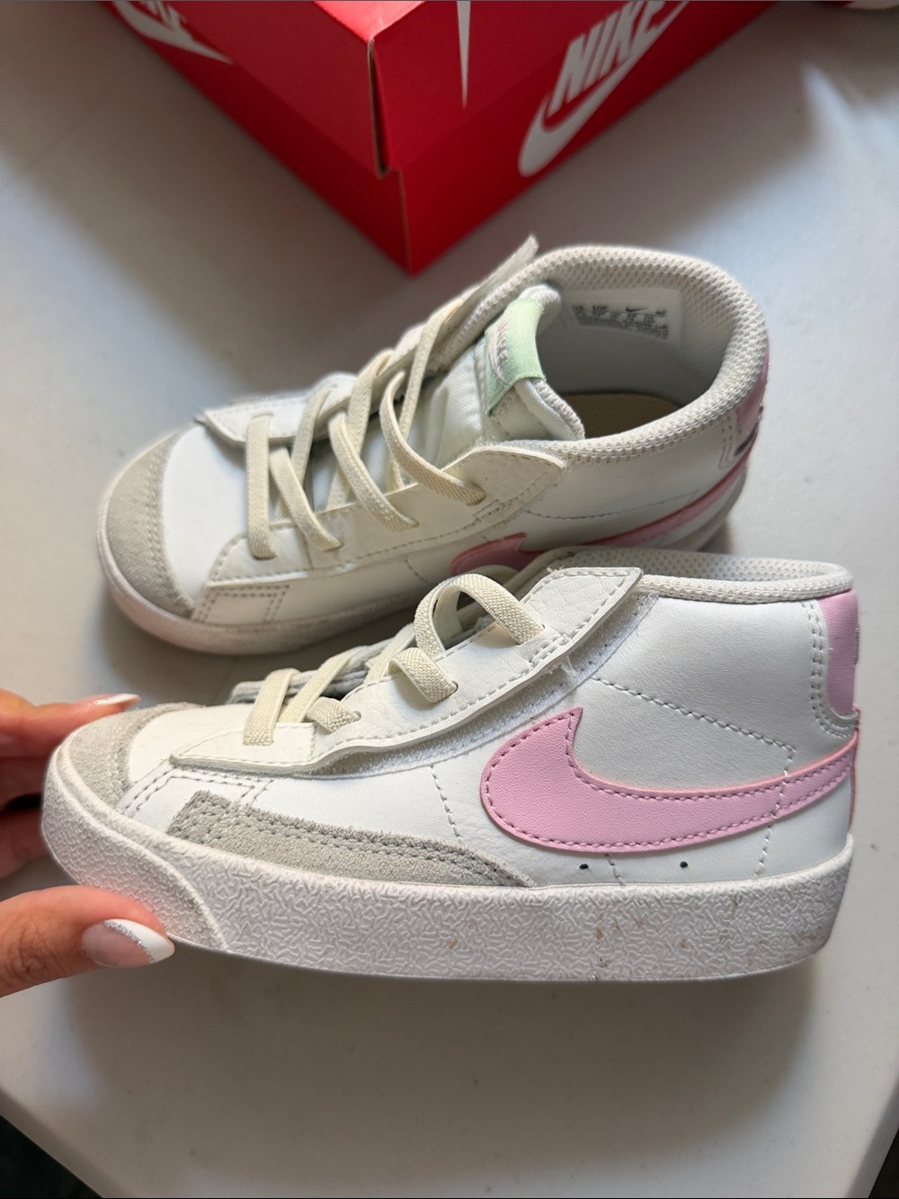 Nike Kids White Mid-Top Sneakers with Pink Swoosh